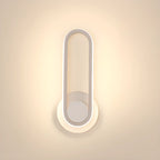 Applique murale LED minimaliste avec finition métallique pour chambre à coucher