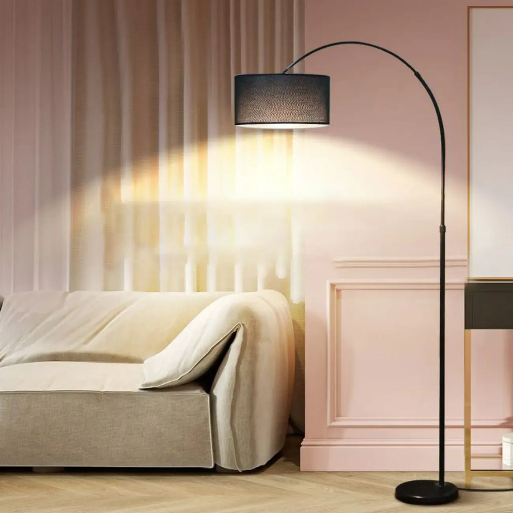 Lampadaire moderne à arc réglable avec abat-jour cylindrique pour salon
