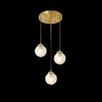 Suspension moderne en verre sculpté doré
