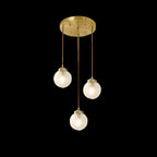Suspension moderne en verre sculpté doré