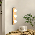Applique murale moderne en verre et pierre beige avec globe