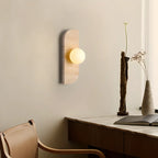 Applique murale moderne en verre et pierre beige avec globe