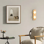 Applique murale moderne en verre et pierre beige avec globe