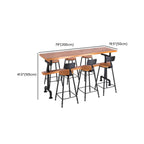 Tables de bar industrielles en bois brun avec plateau fixe et pieds en métal