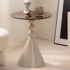 Élégante table d'appoint ronde en verre avec pied central en fer