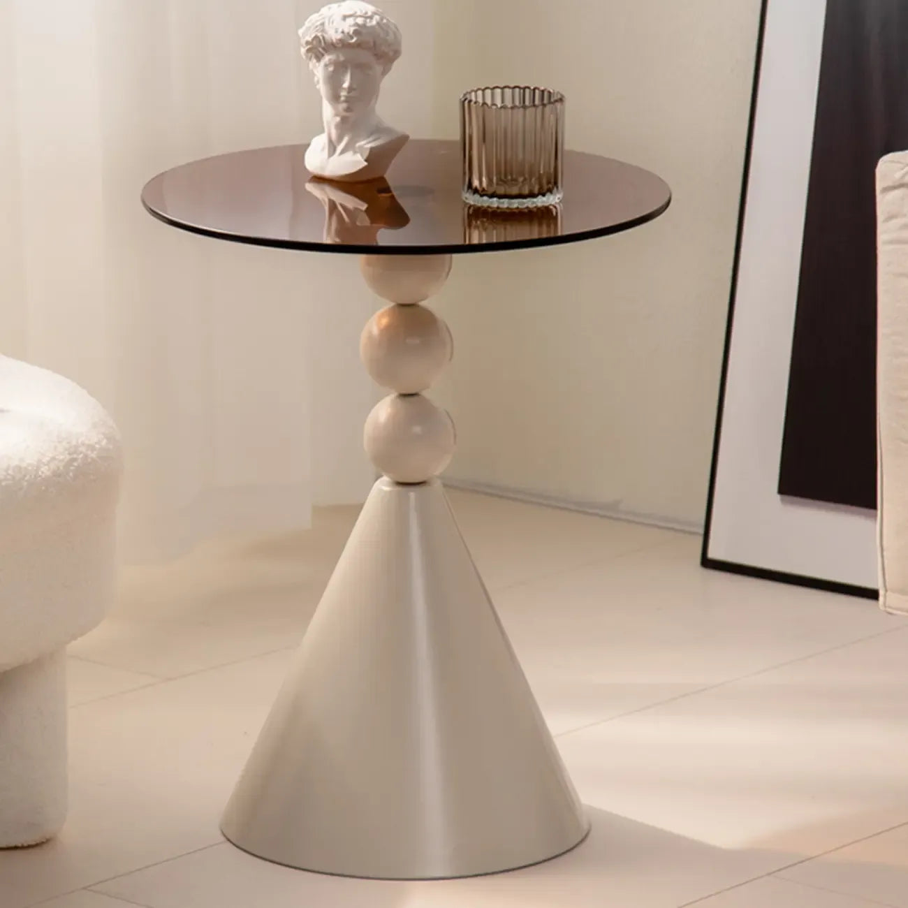 Élégante table d'appoint ronde en verre avec pied central en fer