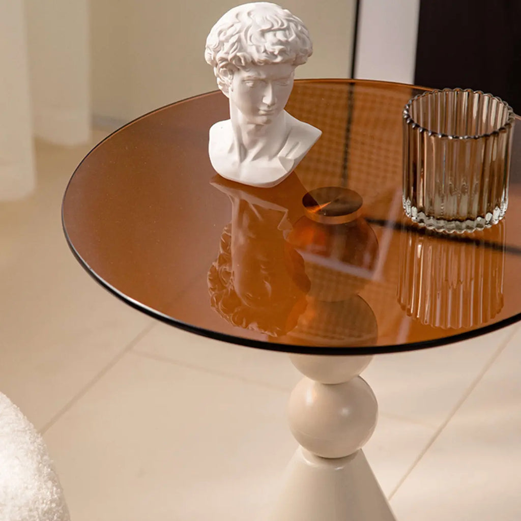 Élégante table d'appoint ronde en verre avec pied central en fer