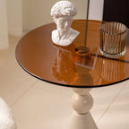 Élégante table d'appoint ronde en verre avec pied central en fer