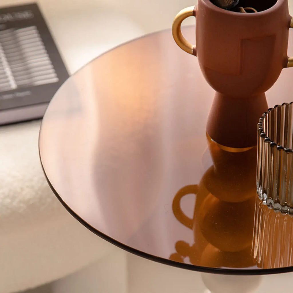 Élégante table d'appoint ronde en verre avec pied central en fer