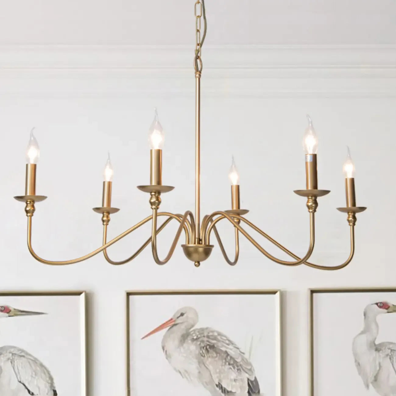 Lampadario classico a candelabro dorato regolabile in altezza
