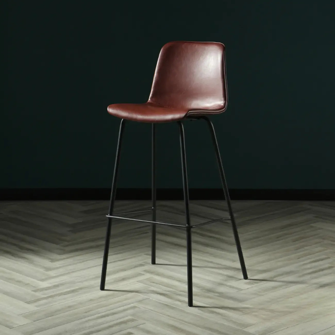 Tabouret de bar industriel en cuir avec structure métallique et repose-pieds