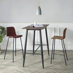 Tabouret de bar industriel en cuir avec structure métallique et repose-pieds