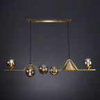 Salle à manger moderne avec suspension LED en laiton et verre pour îlot central