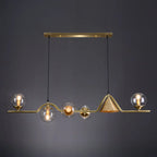Salle à manger moderne avec suspension LED en laiton et verre pour îlot central