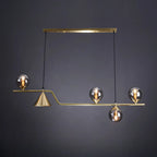Salle à manger moderne avec suspension LED en laiton et verre pour îlot central