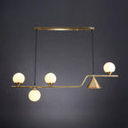 Salle à manger moderne avec suspension LED en laiton et verre pour îlot central