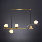 Salle à manger moderne avec suspension LED en laiton et verre pour îlot central