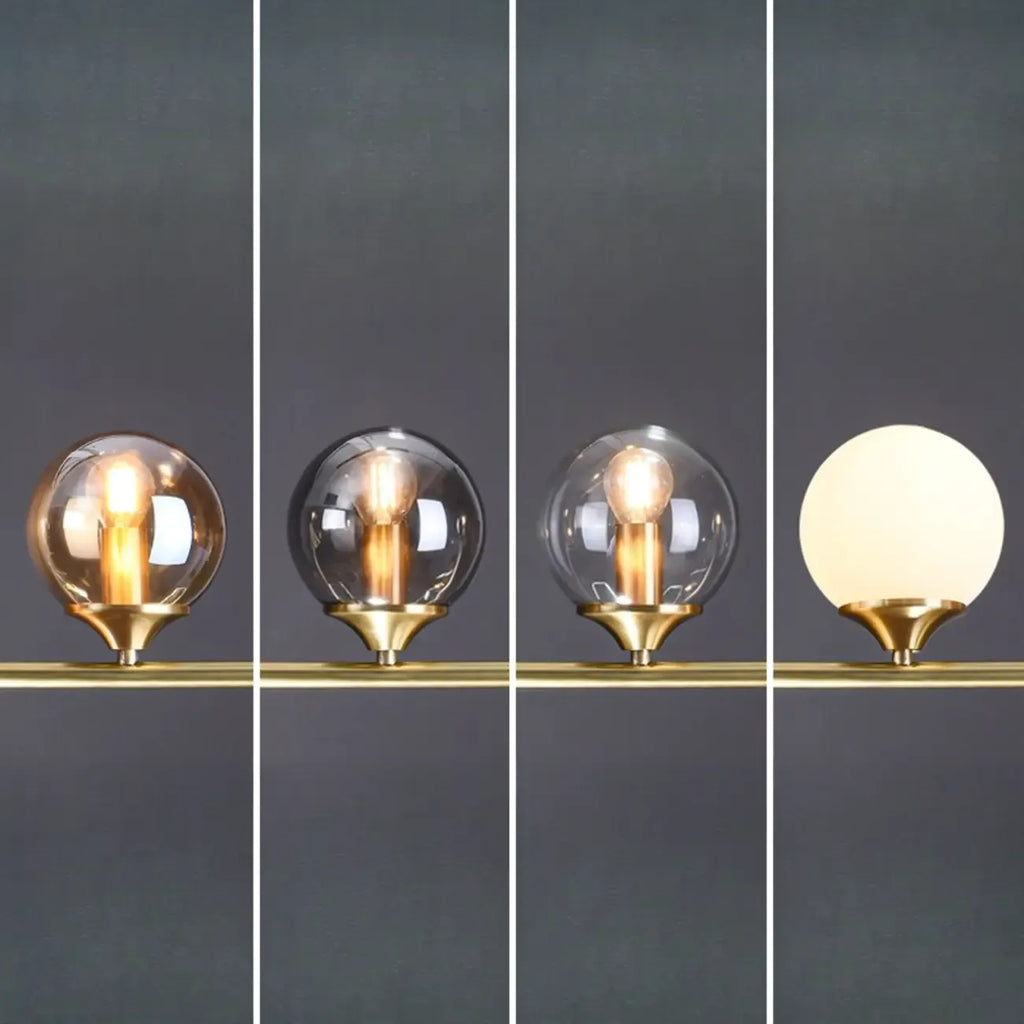 Salle à manger moderne avec suspension LED en laiton et verre pour îlot central