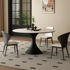 Table de salle à manger ronde moderne avec pied noir et plateau en pierre blanche