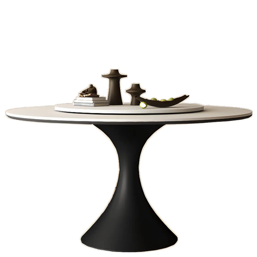 Table de salle à manger ronde moderne avec pied noir et plateau en pierre blanche