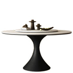 Table de salle à manger ronde moderne avec pied noir et plateau en pierre blanche