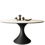 Table de salle à manger ronde moderne avec pied noir et plateau en pierre blanche