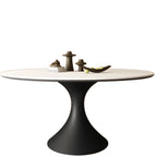 Table de salle à manger ronde moderne avec pied noir et plateau en pierre blanche