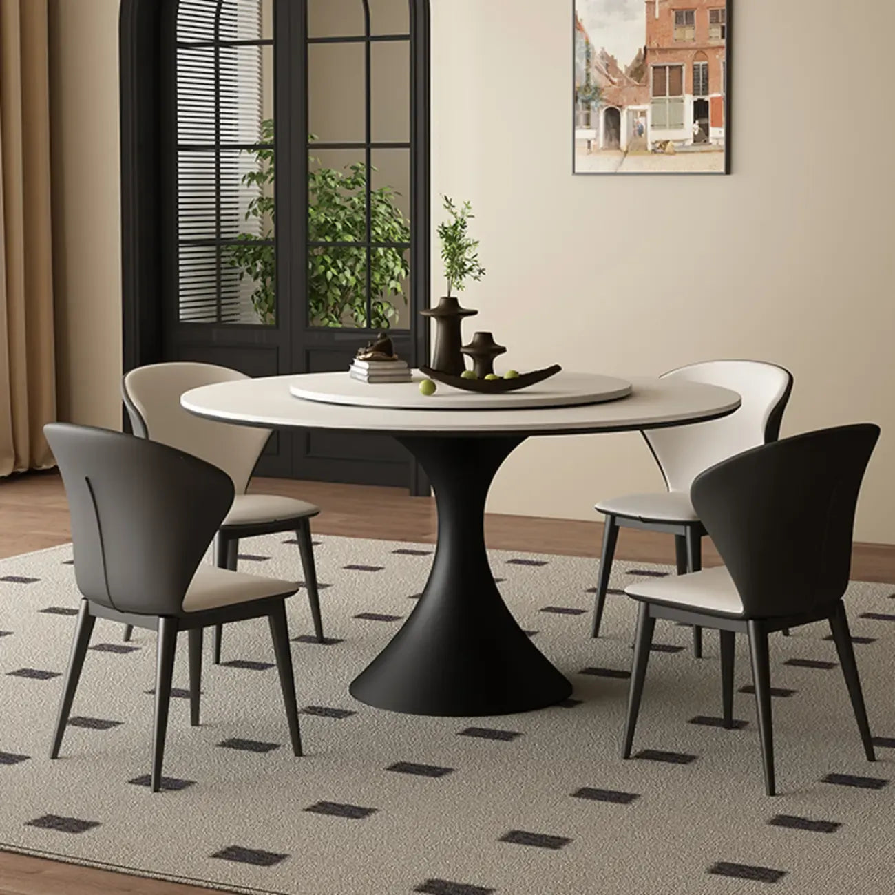 Table de salle à manger ronde moderne avec pied noir et plateau en pierre blanche