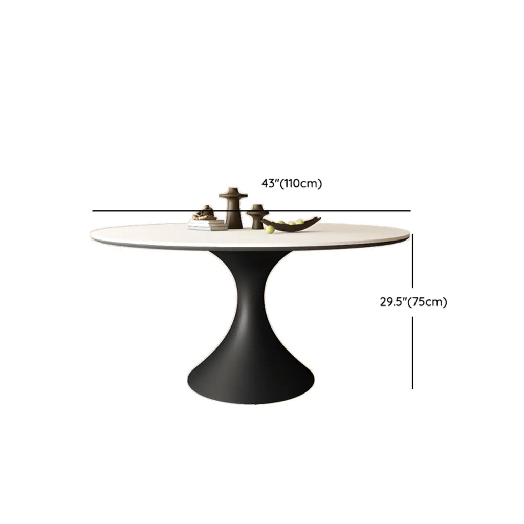 Table de salle à manger ronde moderne avec pied noir et plateau en pierre blanche