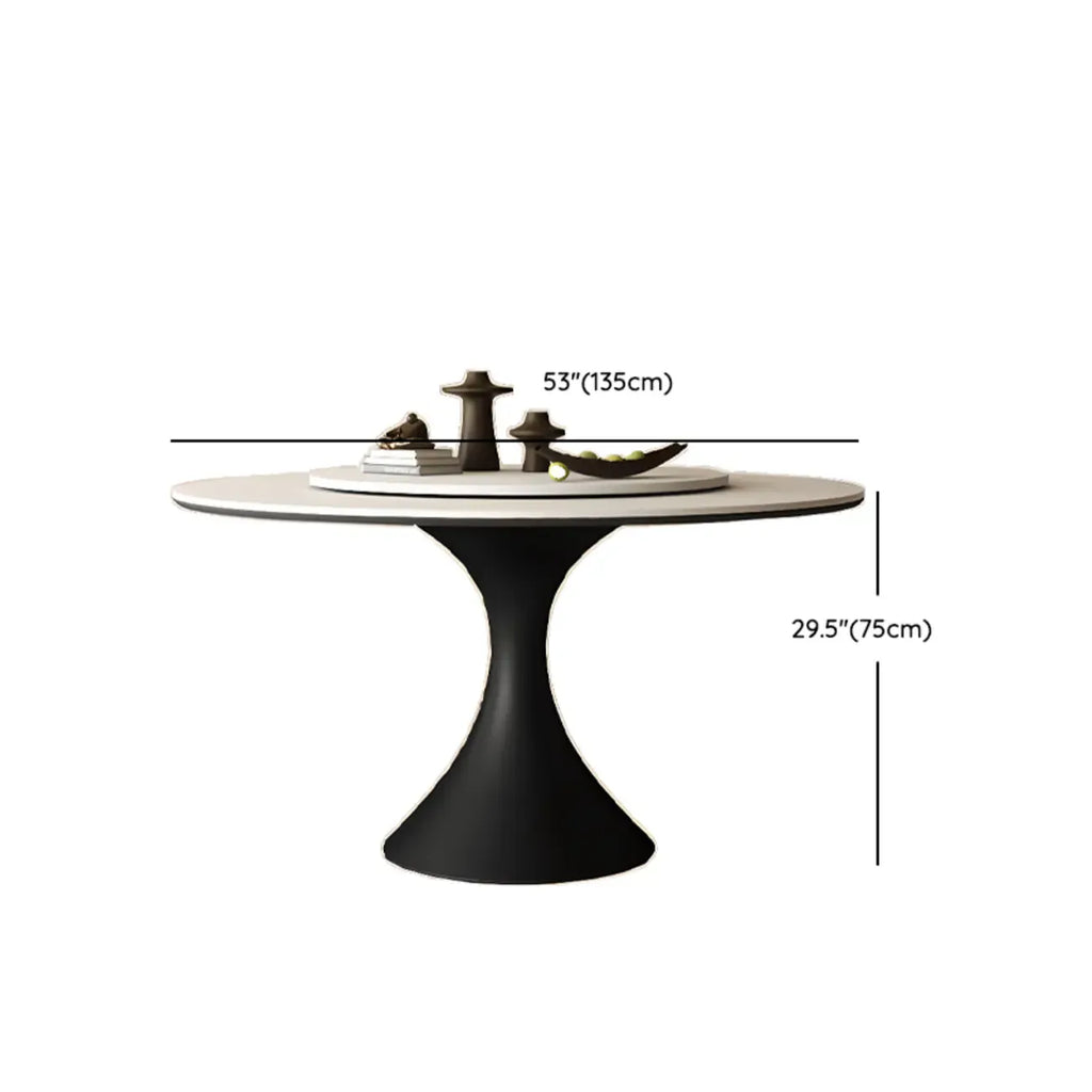 Table de salle à manger ronde moderne avec pied noir et plateau en pierre blanche