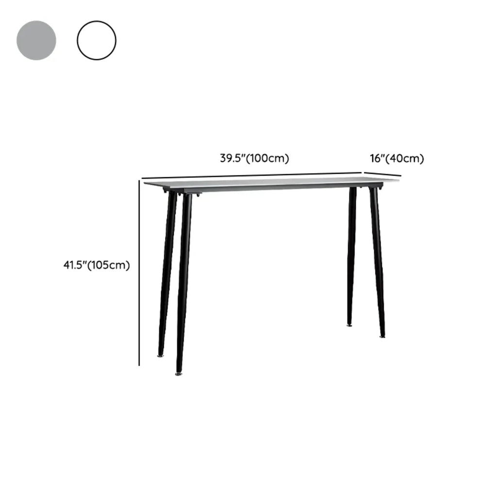 Table de bar moderne avec plateau en travertin gris et pieds en métal, idéale pour la salle à manger.