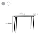 Table de bar moderne avec plateau en travertin gris et pieds en métal, idéale pour la salle à manger.