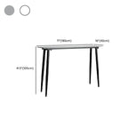 Table de bar moderne avec plateau en travertin gris et pieds en métal, idéale pour la salle à manger.