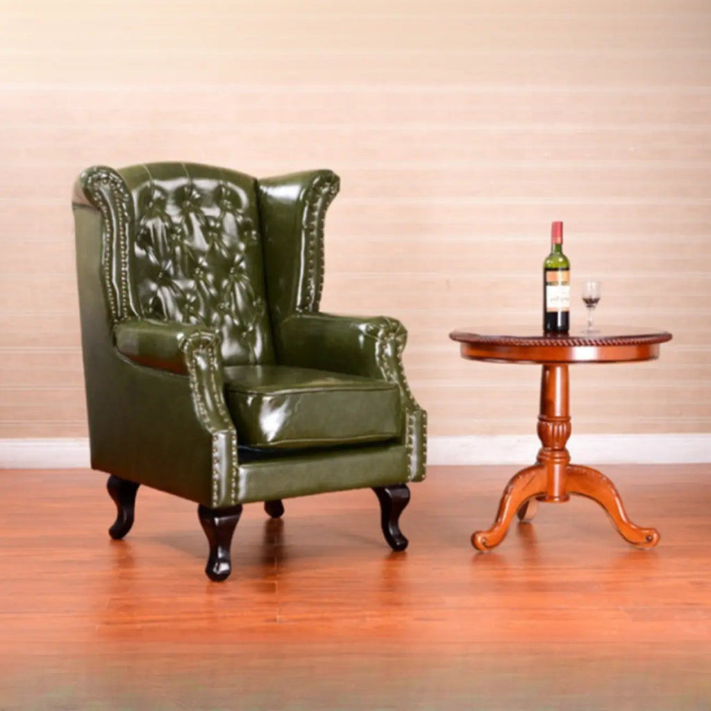 Poltrona Chesterfield tradizionale in pelle con profilo borchiato