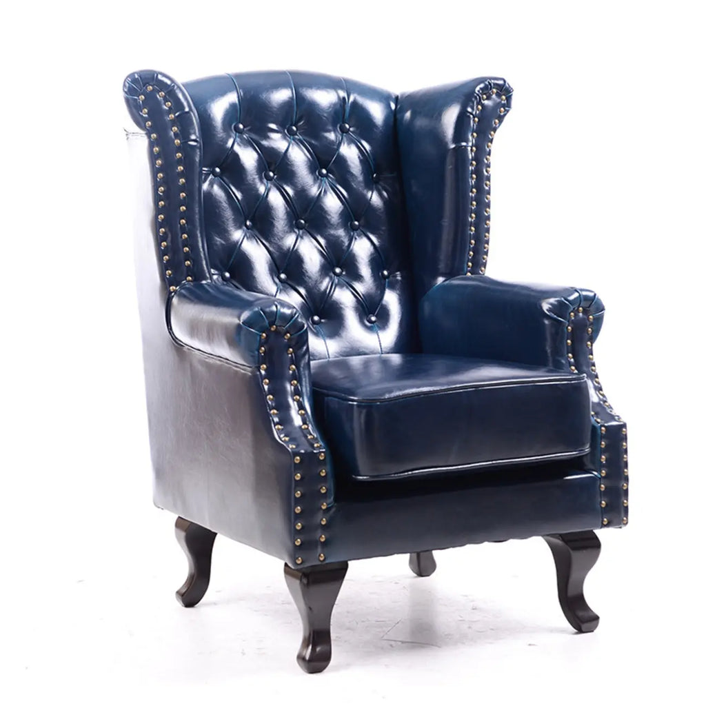 Poltrona Chesterfield tradizionale in pelle con profilo borchiato