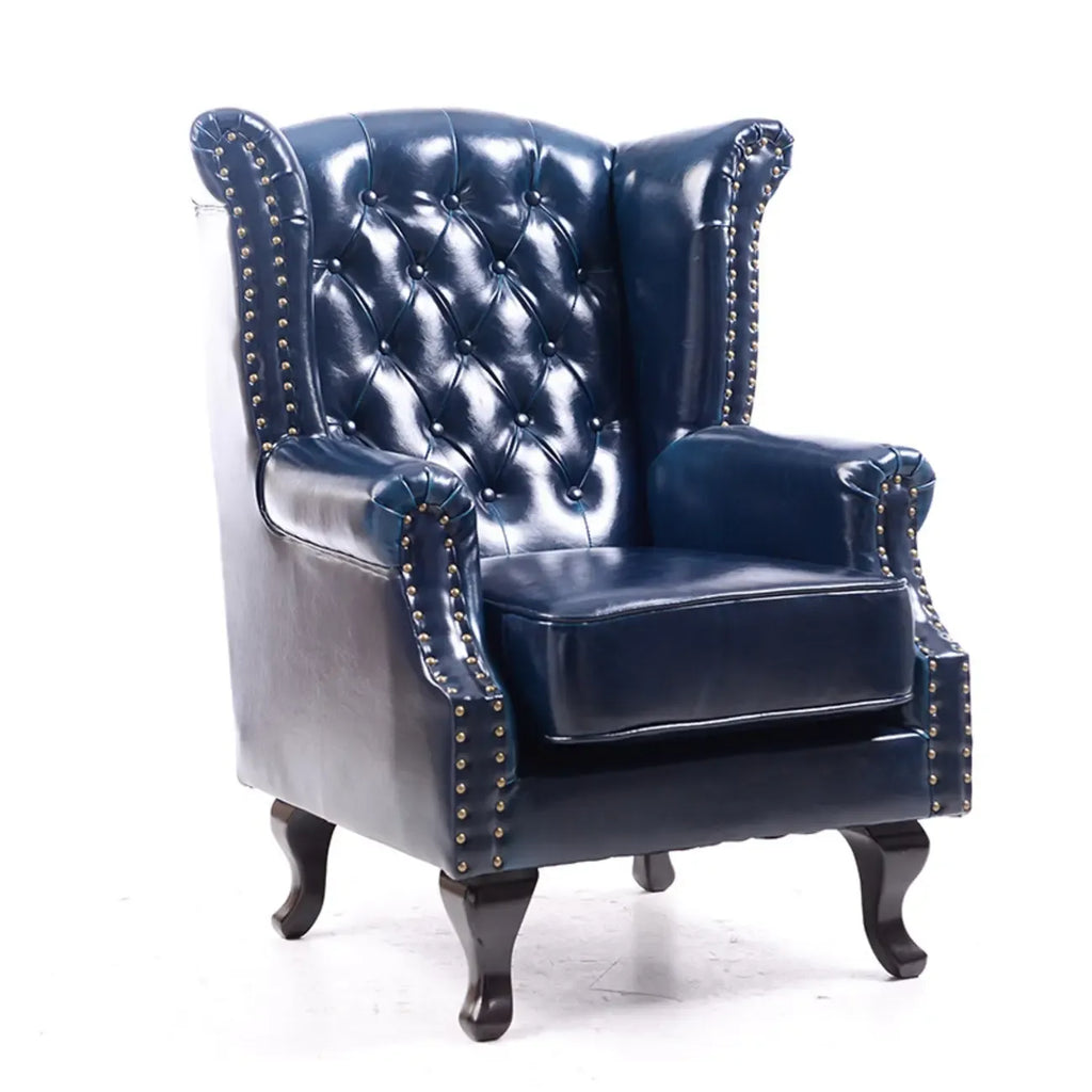 Poltrona Chesterfield tradizionale in pelle con profilo borchiato