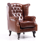 Poltrona Chesterfield tradizionale in pelle con profilo borchiato