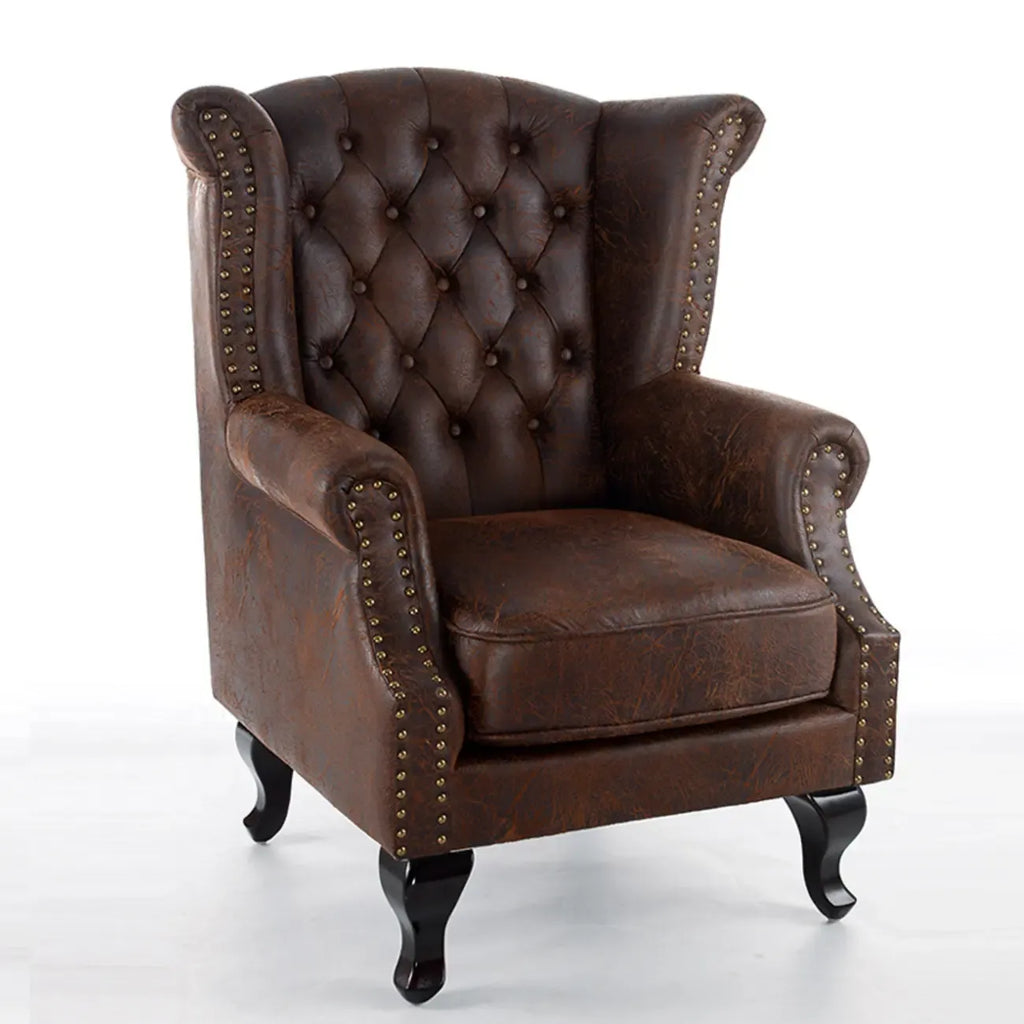Poltrona Chesterfield tradizionale in pelle con profilo borchiato
