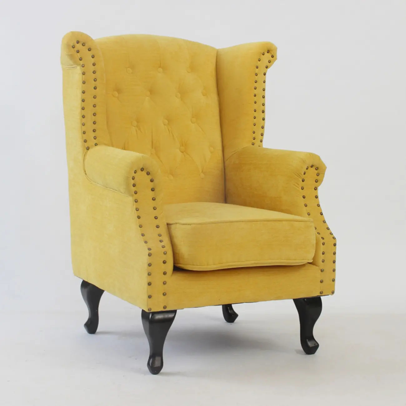 Poltrona Chesterfield tradizionale in pelle con profilo borchiato