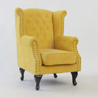 Poltrona Chesterfield tradizionale in pelle con profilo borchiato