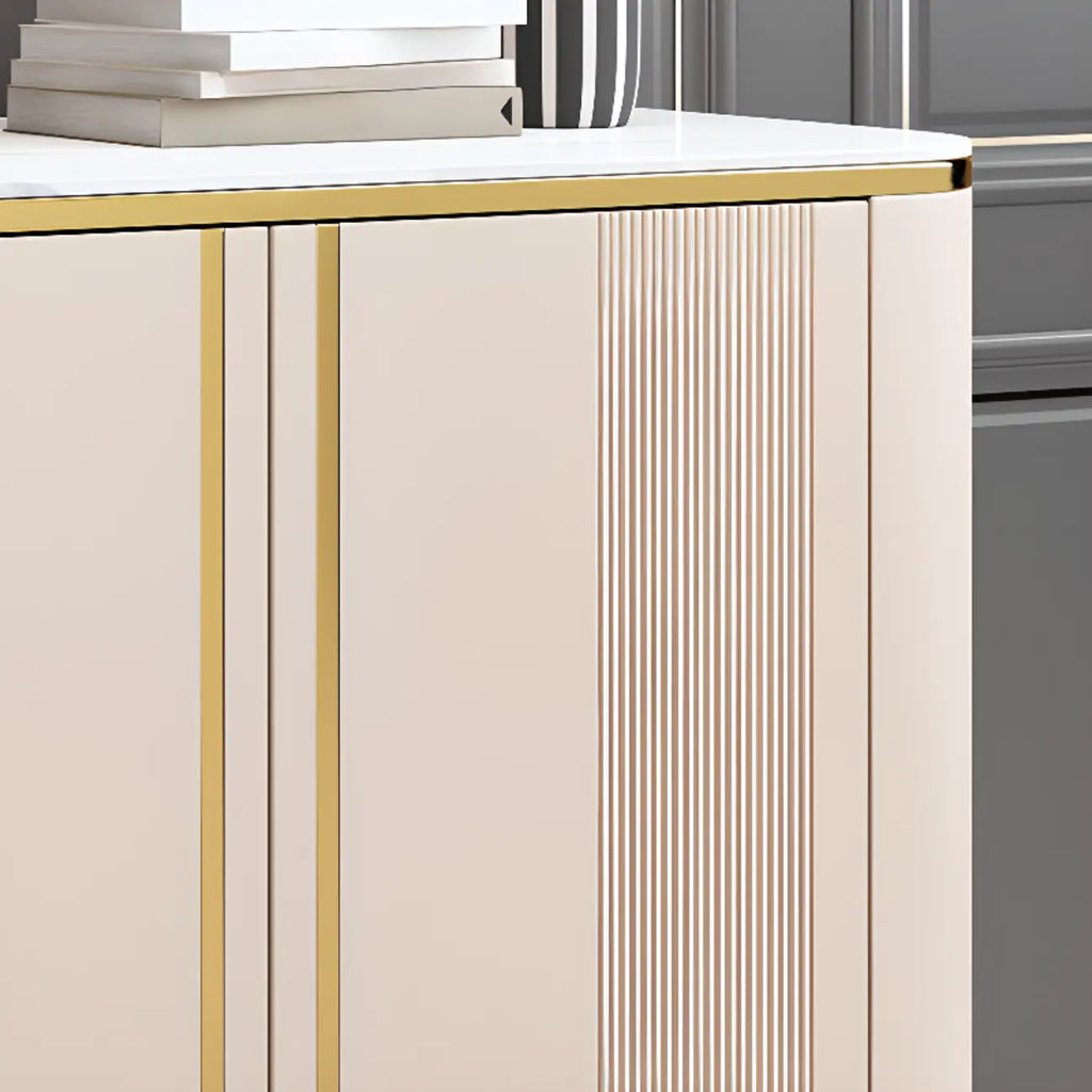 Armoire de rangement en métal doré avec grand plateau en pierre et sans poignée, style glamour