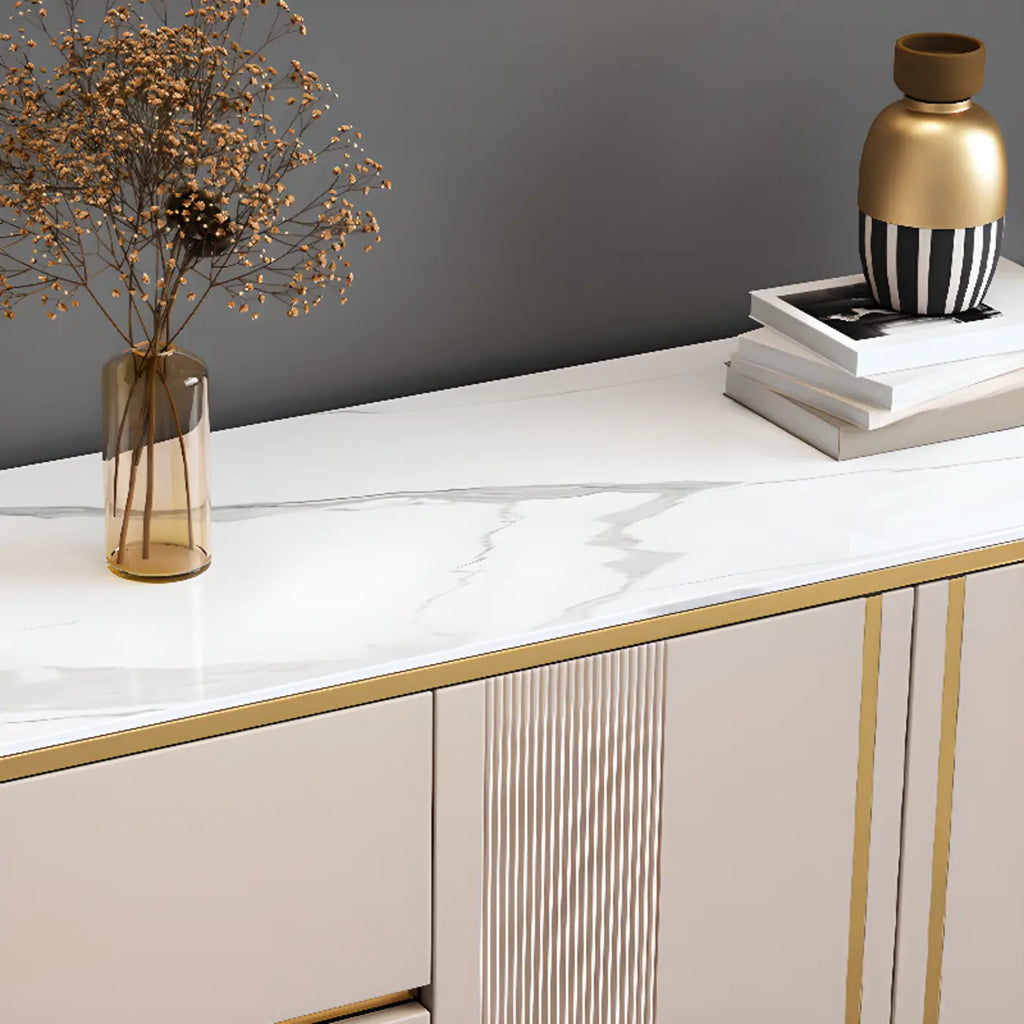 Armoire de rangement en métal doré avec grand plateau en pierre et sans poignée, style glamour