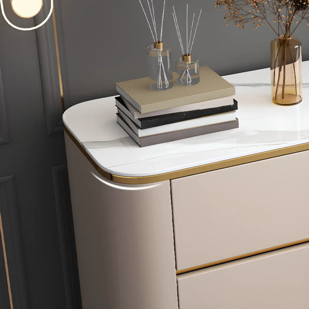 Armoire de rangement en métal doré avec grand plateau en pierre et sans poignée, style glamour