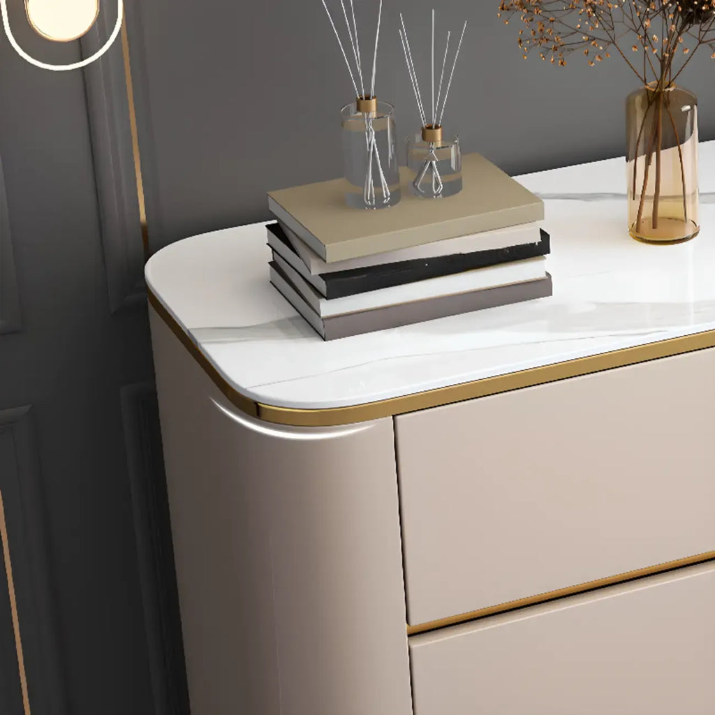 Armoire de rangement en métal doré avec grand plateau en pierre et sans poignée, style glamour