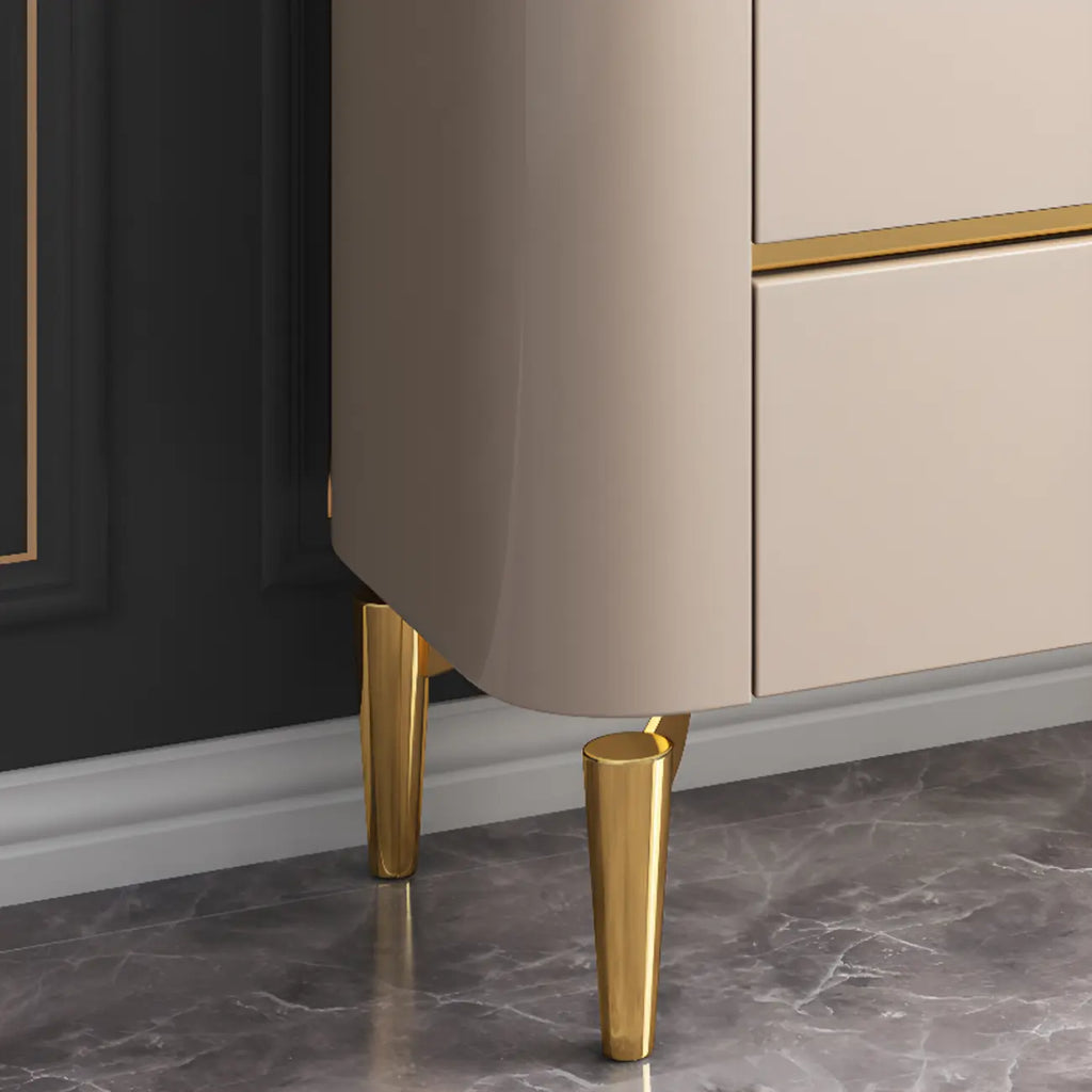 Armoire de rangement en métal doré avec grand plateau en pierre et sans poignée, style glamour
