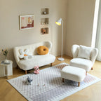 Fauteuil d'appoint minimaliste en tissu avec dossier capitonné pour salon