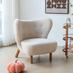 Fauteuil d'appoint minimaliste en tissu avec dossier capitonné pour salon
