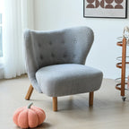 Fauteuil d'appoint minimaliste en tissu avec dossier capitonné pour salon