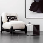 Fauteuil crapaud moderne en tissu noir avec coussin