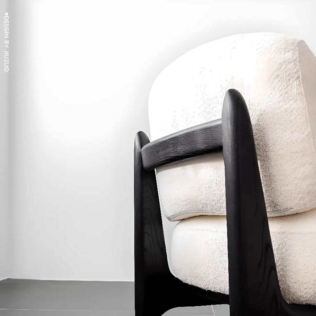 Fauteuil crapaud moderne en tissu noir avec coussin